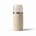 Bottiglia termica in silicone beige con coperchio in acciaio inox 8 x 8 x 20cm